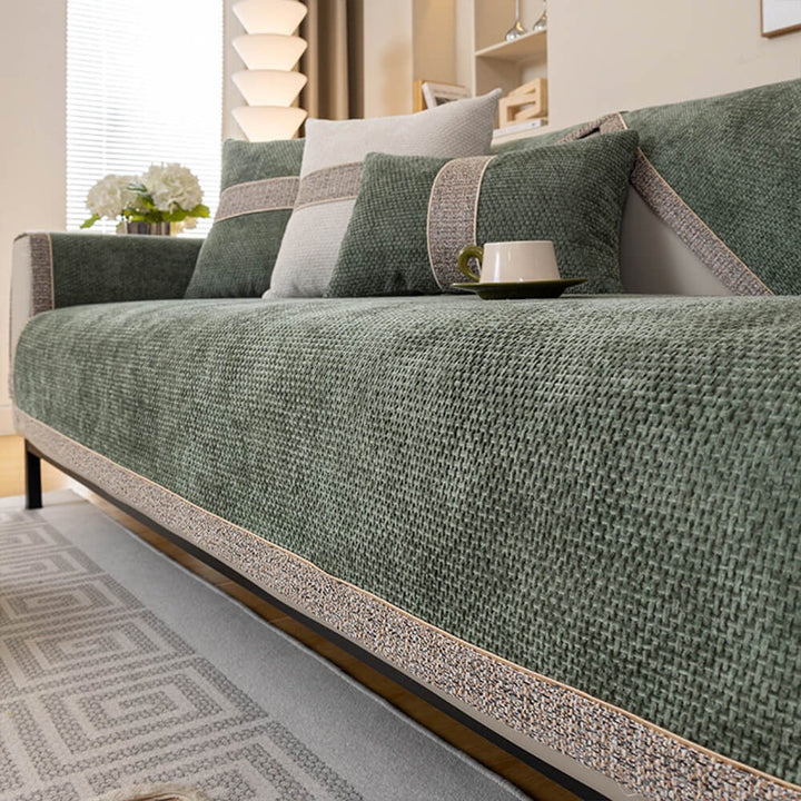 Contemporary woven tweed anti-slip couch cover. Offers durable seat protection & modern home accent for living rooms.