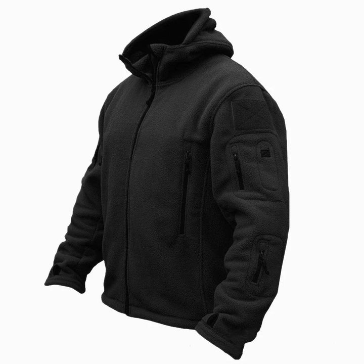 Close-up of a men's tactical hooded jacket showing multi-pockets & durable fabric. Versatile for outdoor use.