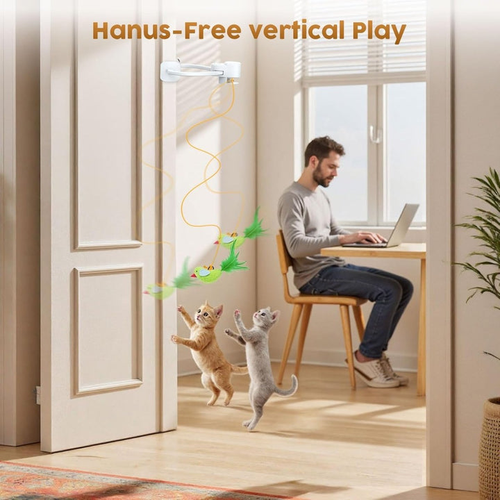 Cat playing with a motion-activated bird toy, stimulating hunting instincts & promoting active play.