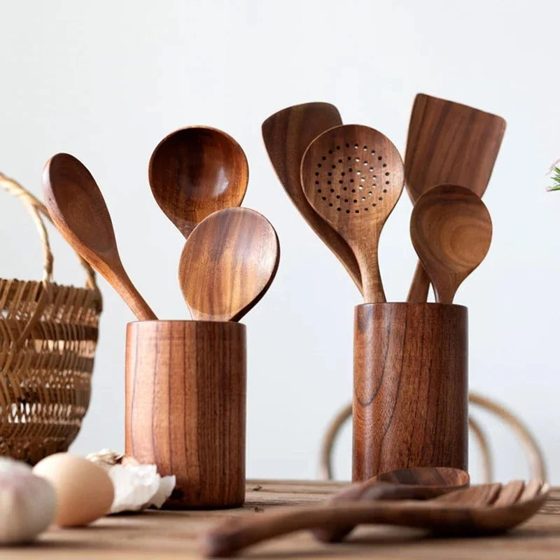 Handcrafted natural teak wood kitchen spoon set. Durable wooden cooking tools for a sustainable kitchen.