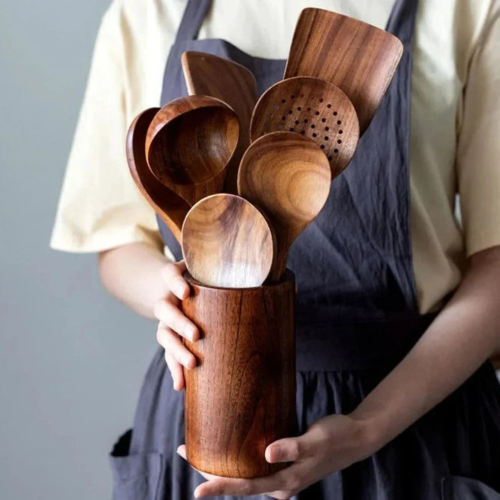 Premium natural teak wood kitchen utensils. Durable, eco-friendly wooden spoon set for modern kitchens.