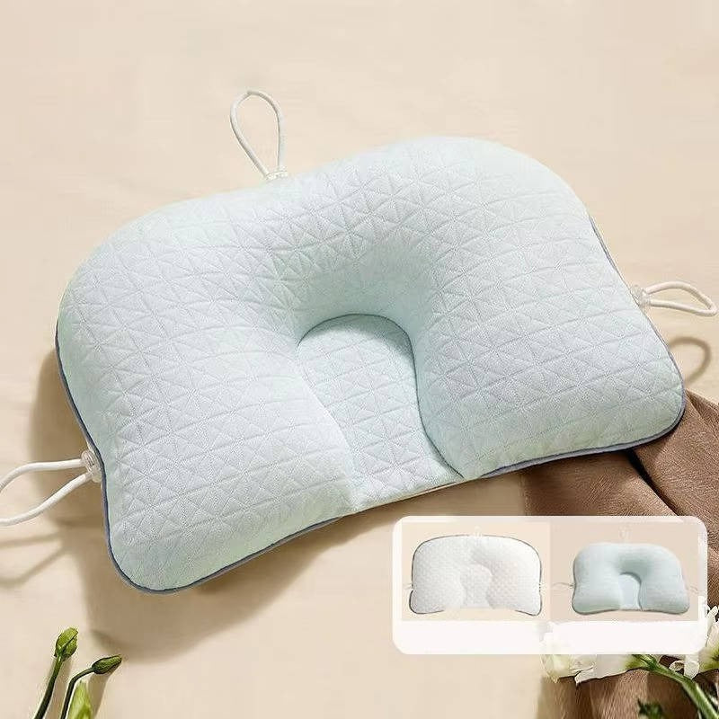 Newborn baby pillow for flat head prevention & ergonomic support.