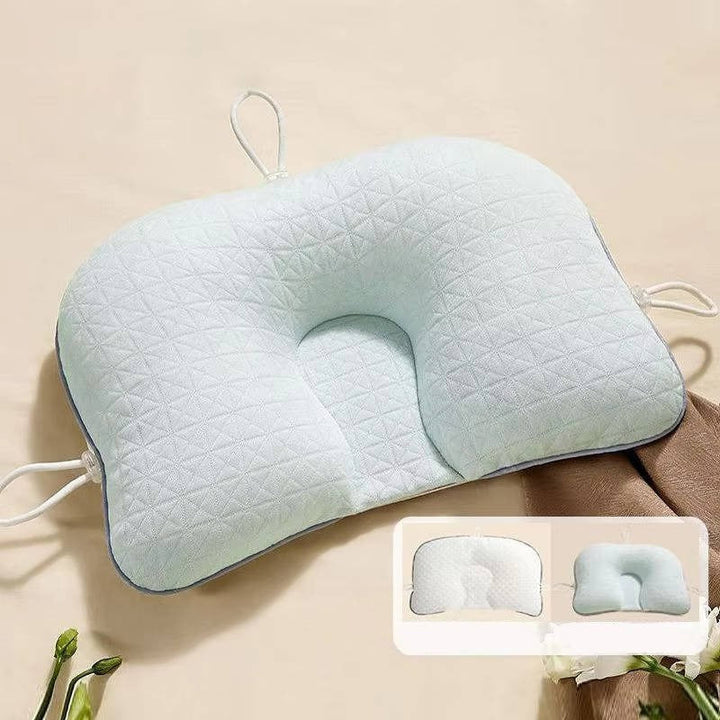 Newborn baby pillow for flat head prevention & ergonomic support.