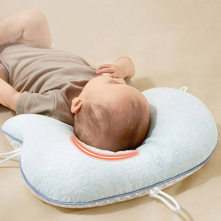 Versatile baby pillow for flat head prevention, head shaping & ergonomic support; a newborn & infant travel essential.
