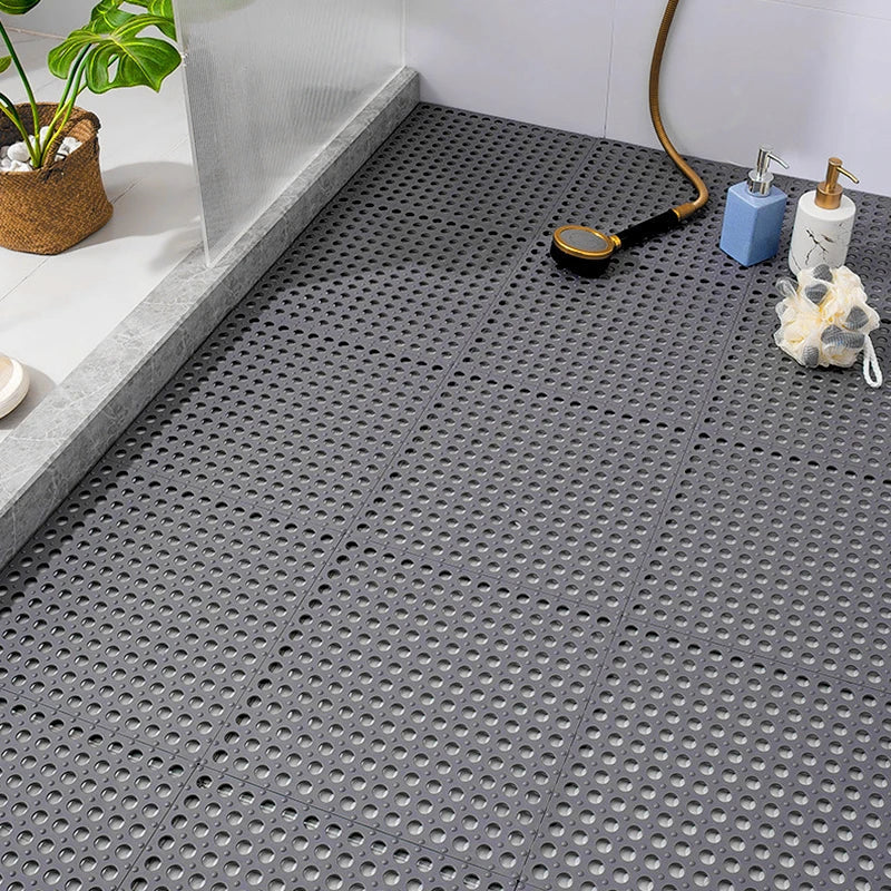 Non-slip shower mat set in white, interlocking for bathroom safety and grip.