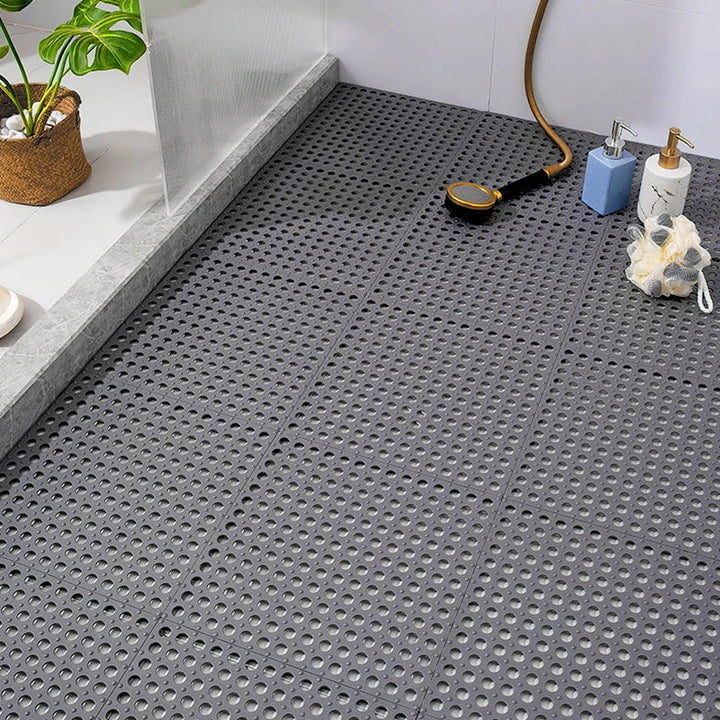 Non-slip shower mat set in white, interlocking for bathroom safety and grip.
