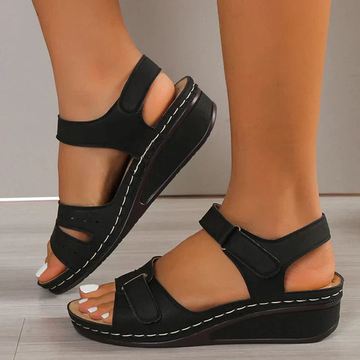 Fashionable open-toe orthopedic sandals for women, versatile for dressy or casual summer outfits, slip-resistant.