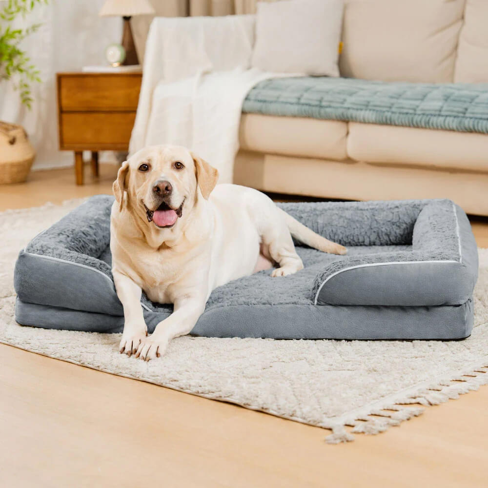 Orthopedic dog bed with full surround support for pets, offering joint comfort for senior dogs with arthritis.