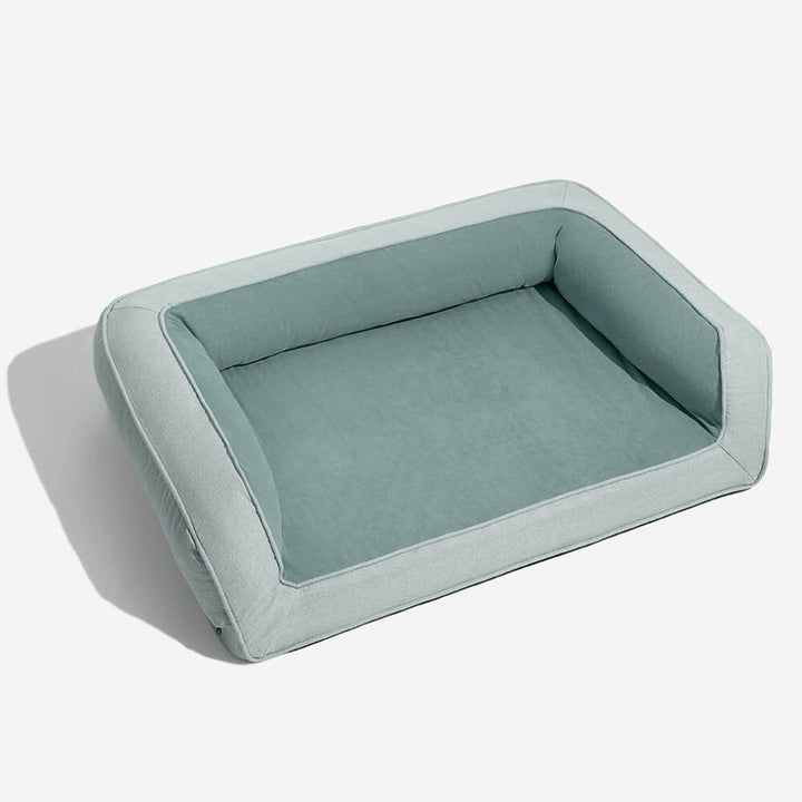 Luxury dog sofa bed for joint pain relief. Durable, washable orthopedic pet bed ensures ultimate dog comfort.