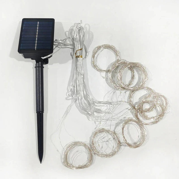 Festive outdoor solar curtain lights, perfect for garden, gazebo, or balcony decor.