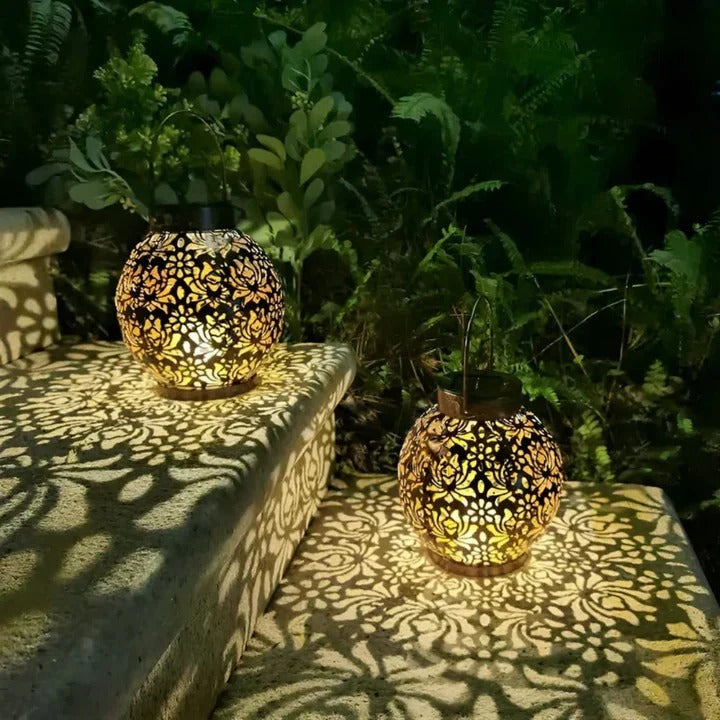 Energy-efficient outdoor solar LED pendant lamp, showcasing its bright light for garden and patio decor.