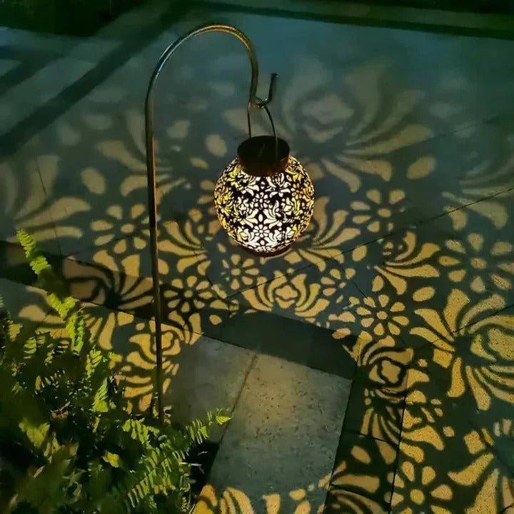 Outdoor LED pendant light with a remote control, offering convenient, energy-efficient solar lighting for any garden.