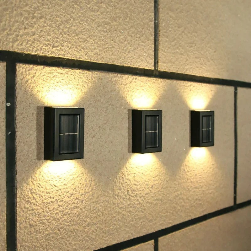 Bright LED solar garden lamp providing security lighting for an outdoor patio. Energy-efficient & wireless design.
