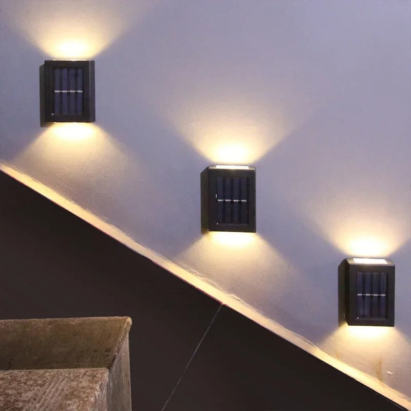 Sleek outdoor solar LED wall lamp, ideal for modern garden decor & efficient exterior lighting solutions.