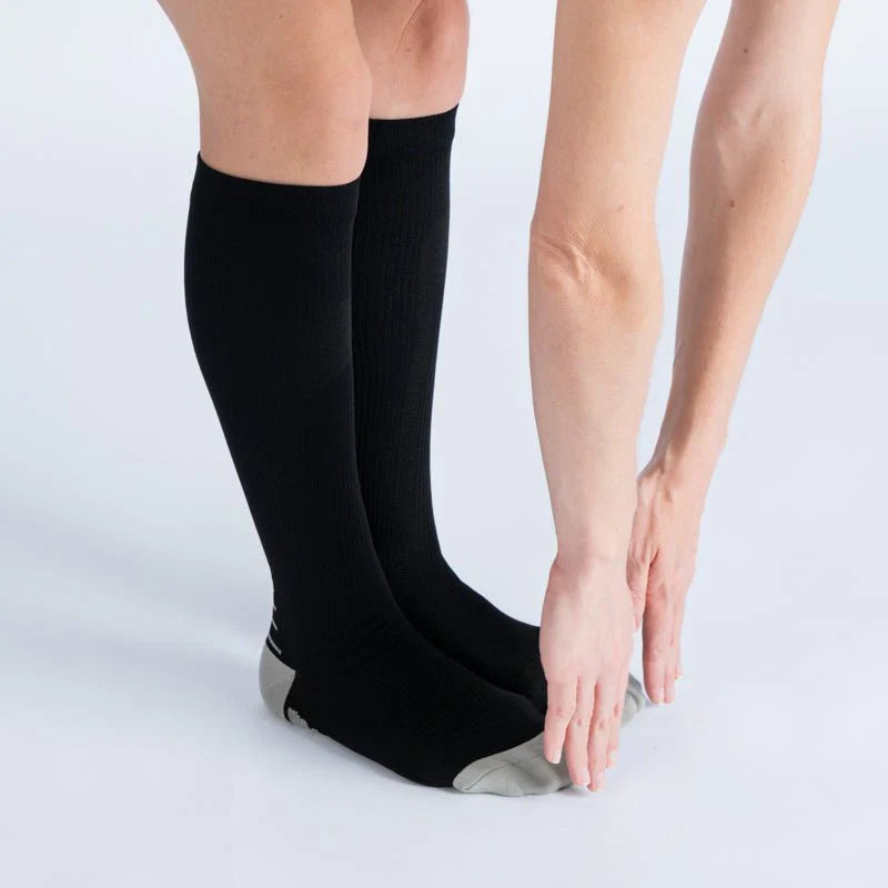 Unisex black and white compression socks, designed for all-day comfort and better circulation