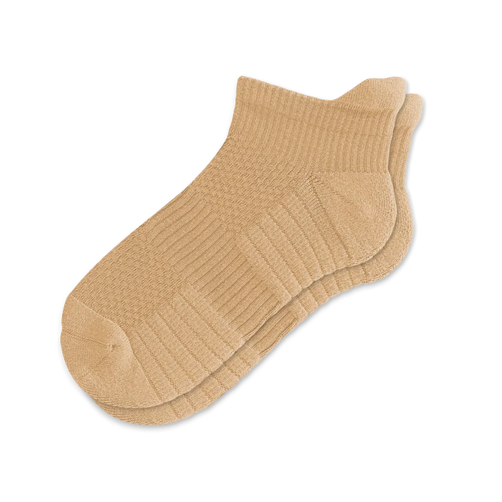 Pair of tan unisex ankle compression socks providing gentle support and foot comfort.