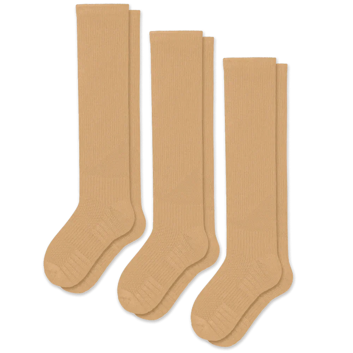 View of tan unisex compression socks, perfect for daily wear, offering gentle support for leg health.