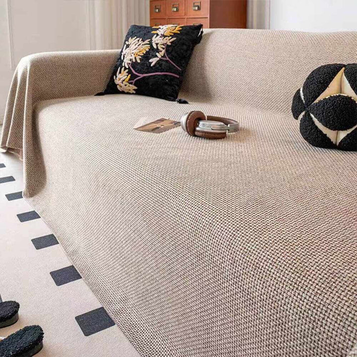 Durable polyester sofa cover with linen-look texture. Pet-friendly, scratch-resistant, washable couch protector for homes.