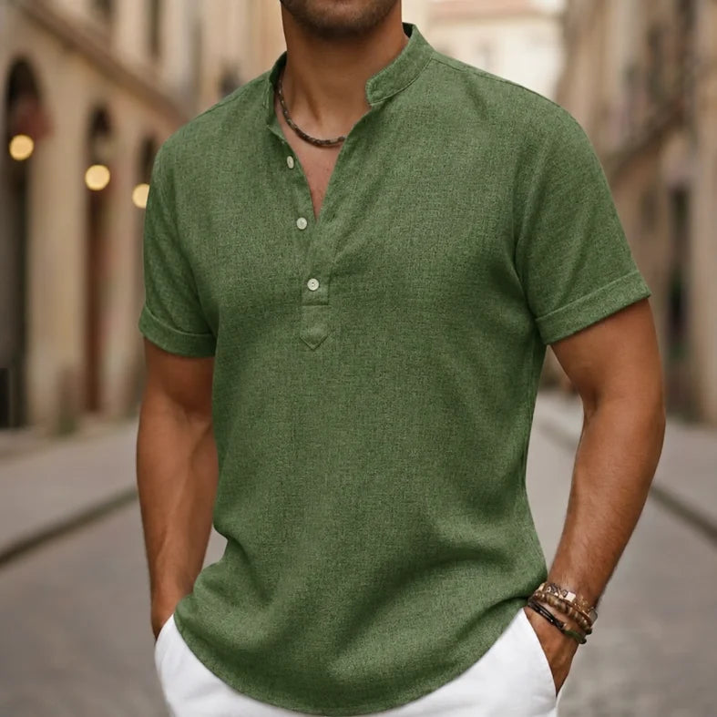 Green men's casual short sleeve Henley shirt, comfortable for warm weather.