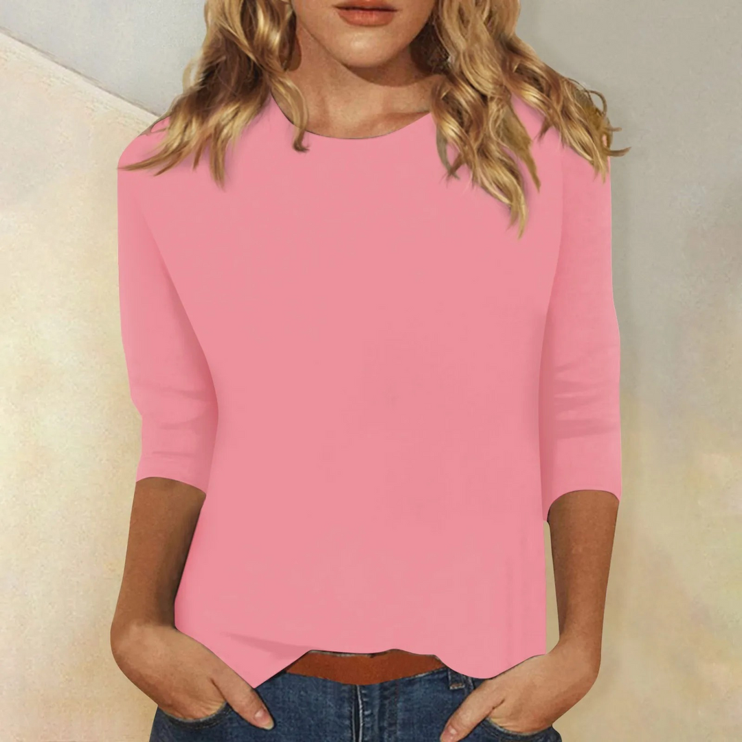 Pink women's casual round neck top with comfortable 3/4 sleeves, perfect for relaxed everyday fashion.