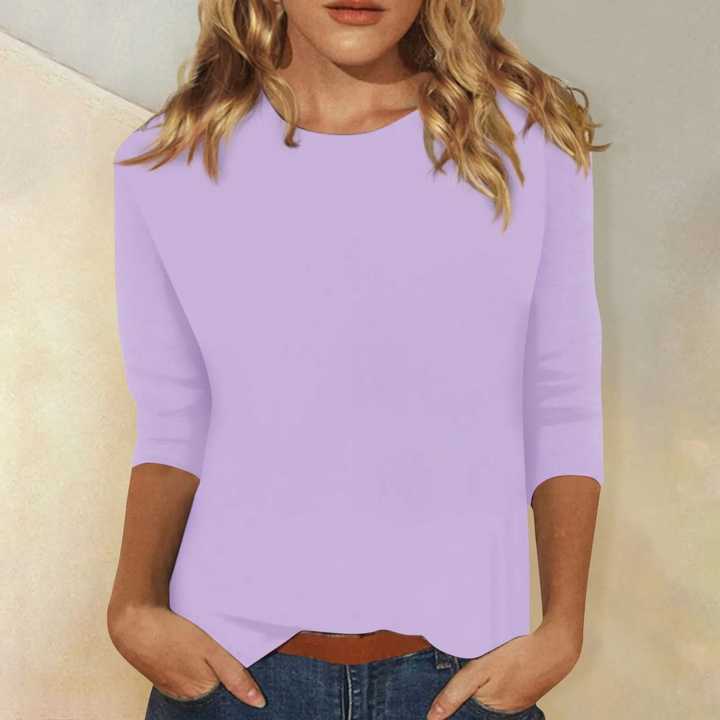Black women's minimalist style 3/4 sleeve round neck top, ideal for comfortable everyday outfits.