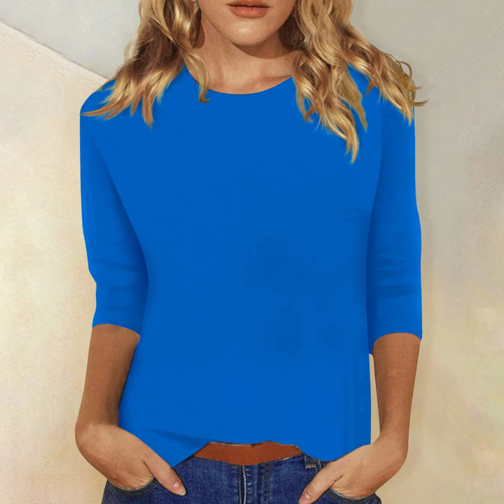 Relaxed fit pink women's round neck top with 3/4 sleeves, great for versatile casual everyday fashion.
