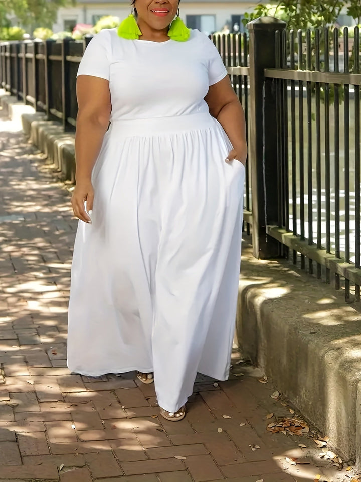 Plus size flowy maxi dress for women, short sleeve, with convenient pockets.