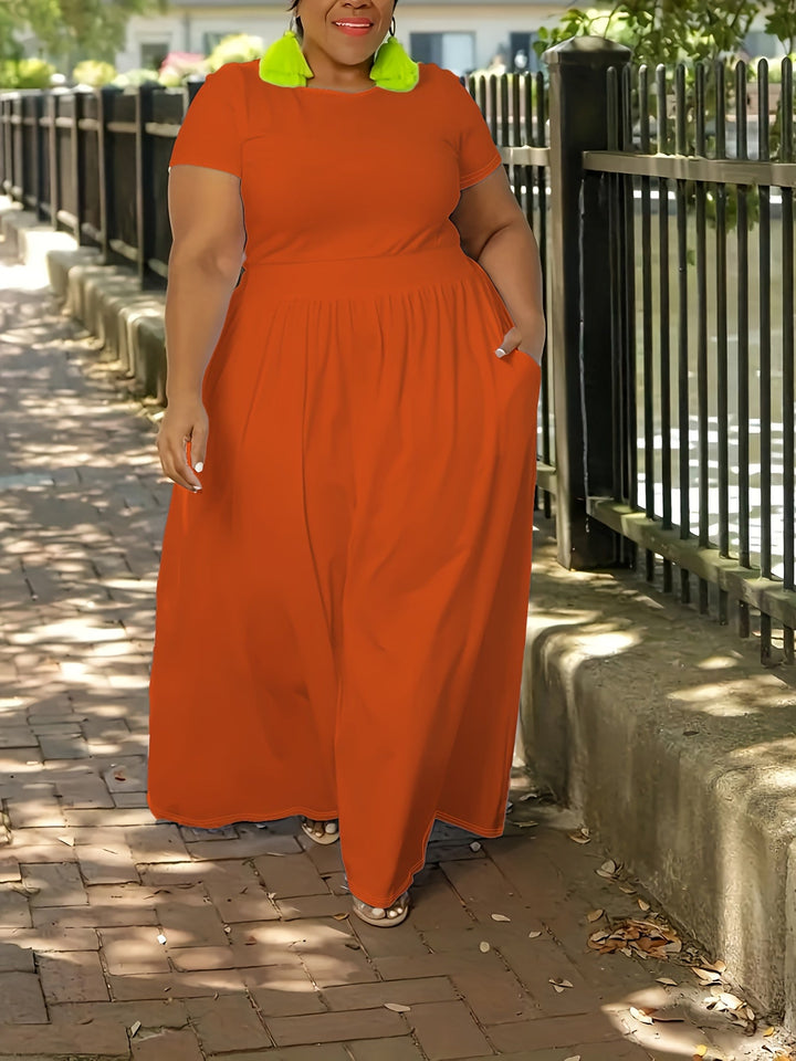 Plus size women's summer dress, elegant flowy maxi style, with handy pockets.