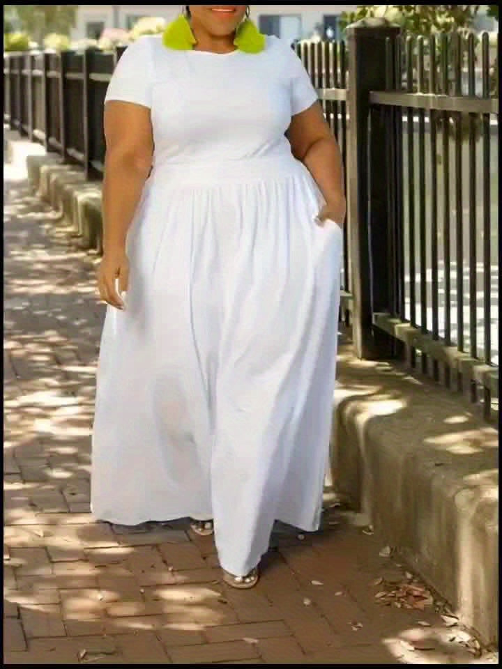 Comfortable plus size flowy maxi dress with pockets, perfect short sleeve women's wear.