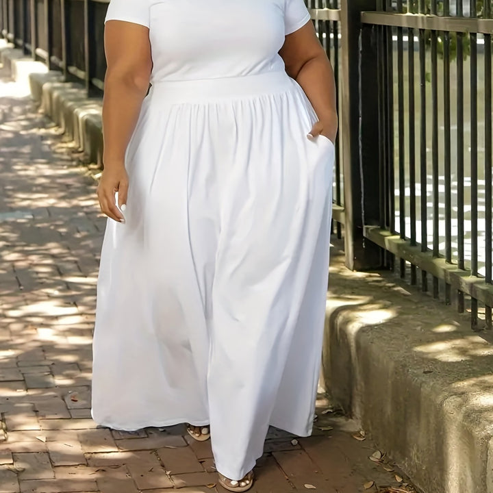 Versatile women's plus size maxi dress, flowy fit, short sleeves, and pockets.
