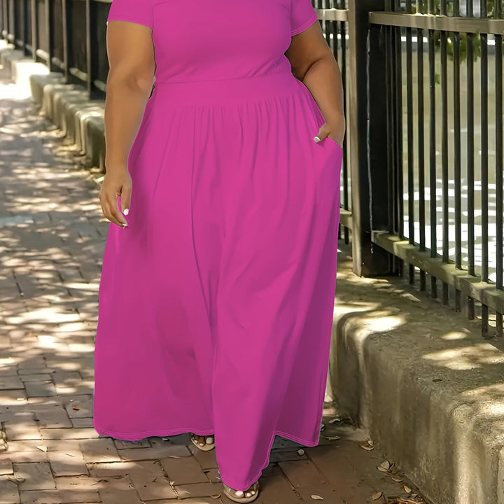 Elegant and comfortable plus size flowy maxi dress, short sleeve, with essential pockets.