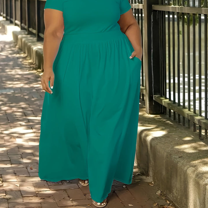 Casual summer women's plus size flowy maxi dress, short sleeves & practical pockets.