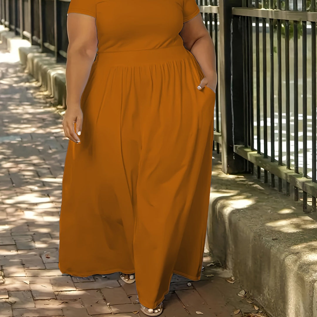 Plus size women's maxi dress, flowy design, short sleeves, perfect for comfort & style.