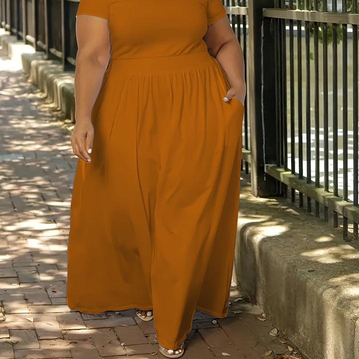 Plus size women's maxi dress, flowy design, short sleeves, perfect for comfort & style.