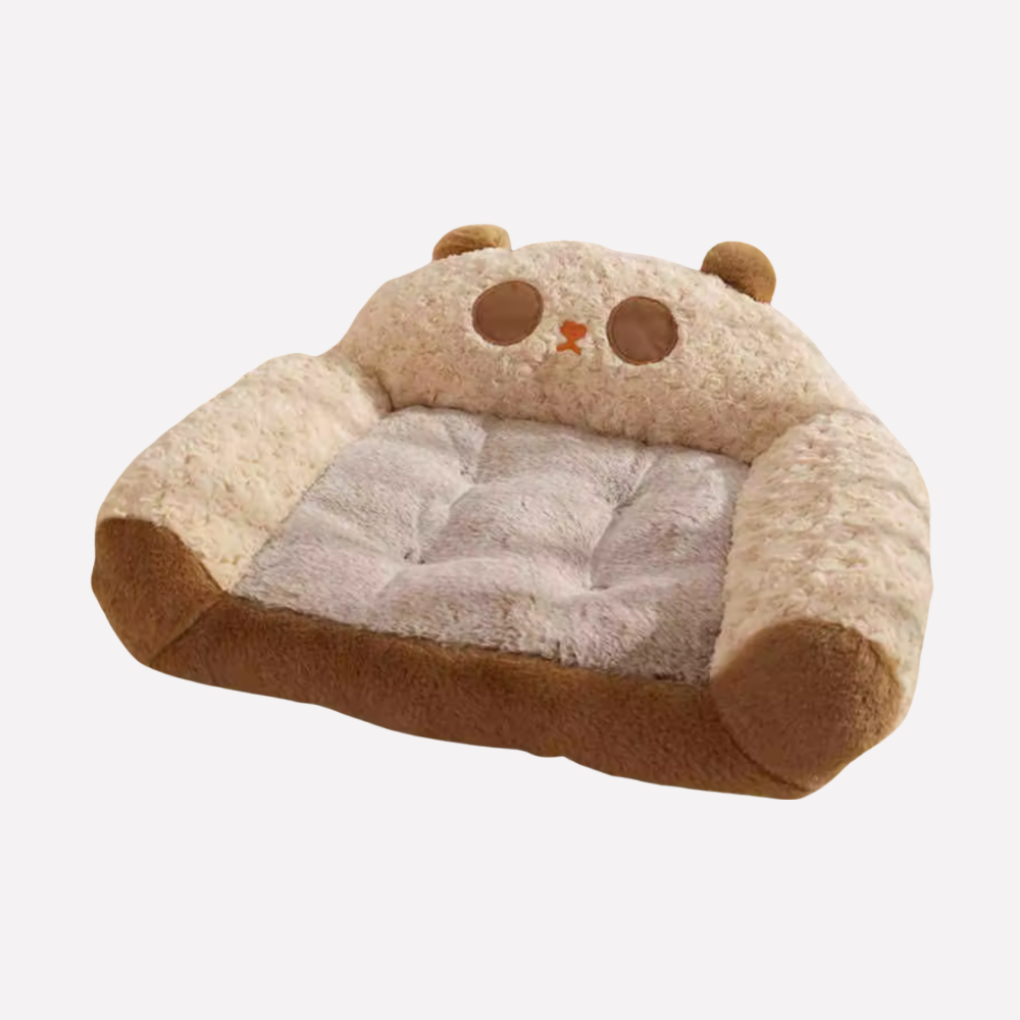 Soft plush curled dog bed with a nest design, providing ultimate coziness and security for pets. Washable.