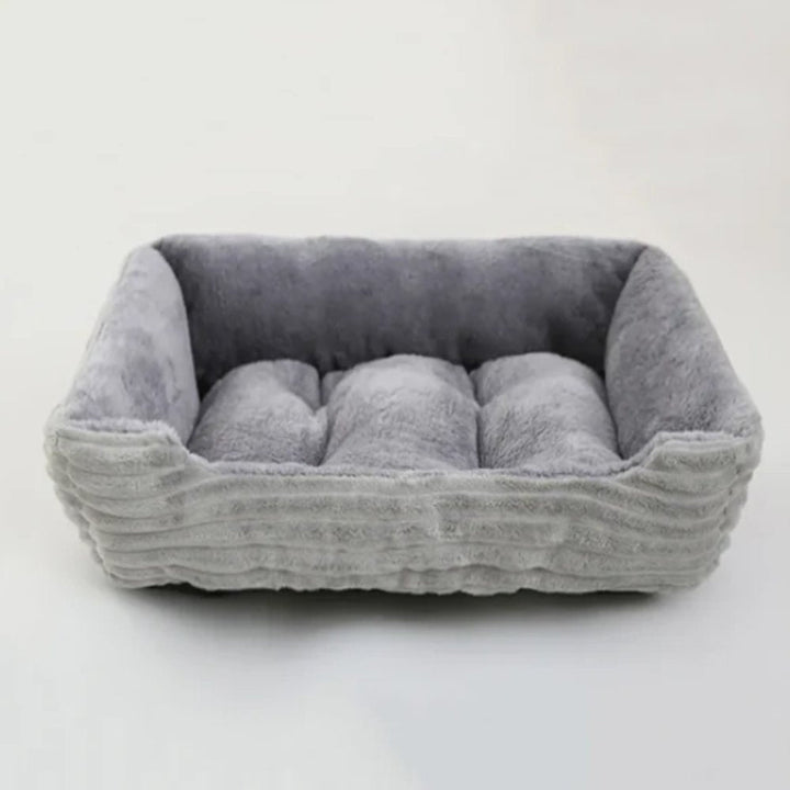 Plush dog bed for ultimate comfort. Soft, cozy, washable pet bed for secure relaxation.