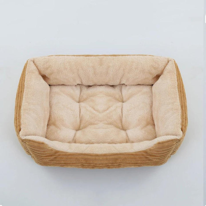 Plush pet bed for small to large dogs. Super soft, washable dog bed provides cozy, secure rest.