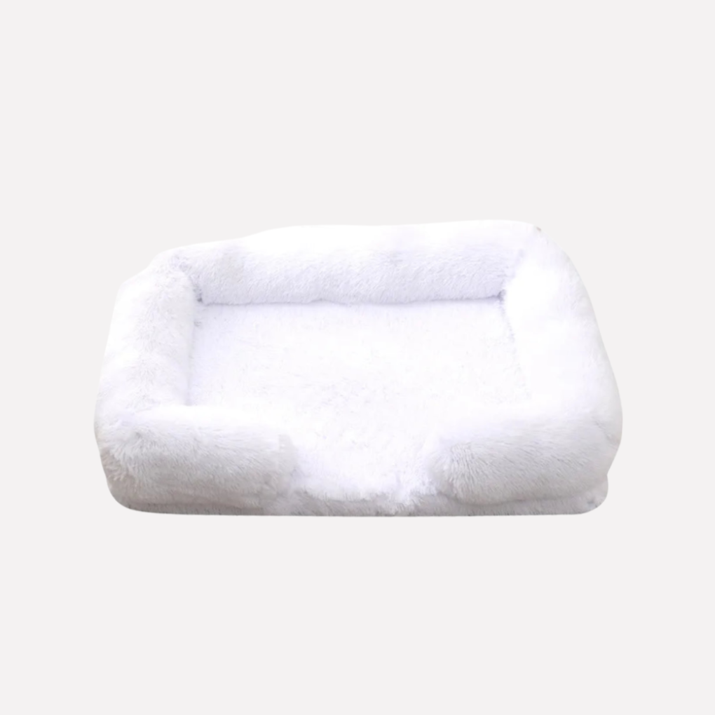 Luxurious plush pet bed, non-slip, promotes deep sleep for furry friends.