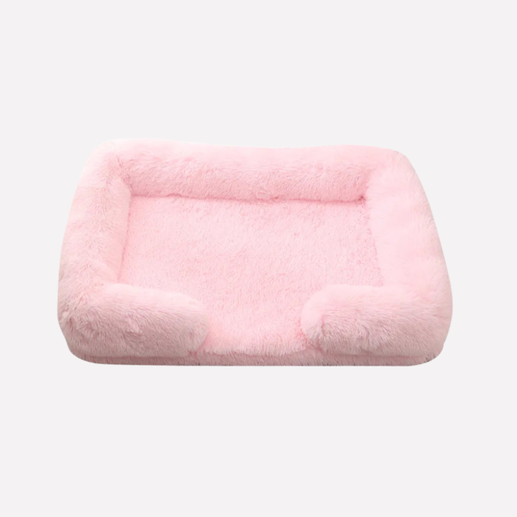 Machine washable plush dog bed, non-slip base, ultimate pet comfort.