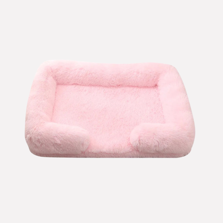 Machine washable plush dog bed, non-slip base, ultimate pet comfort.