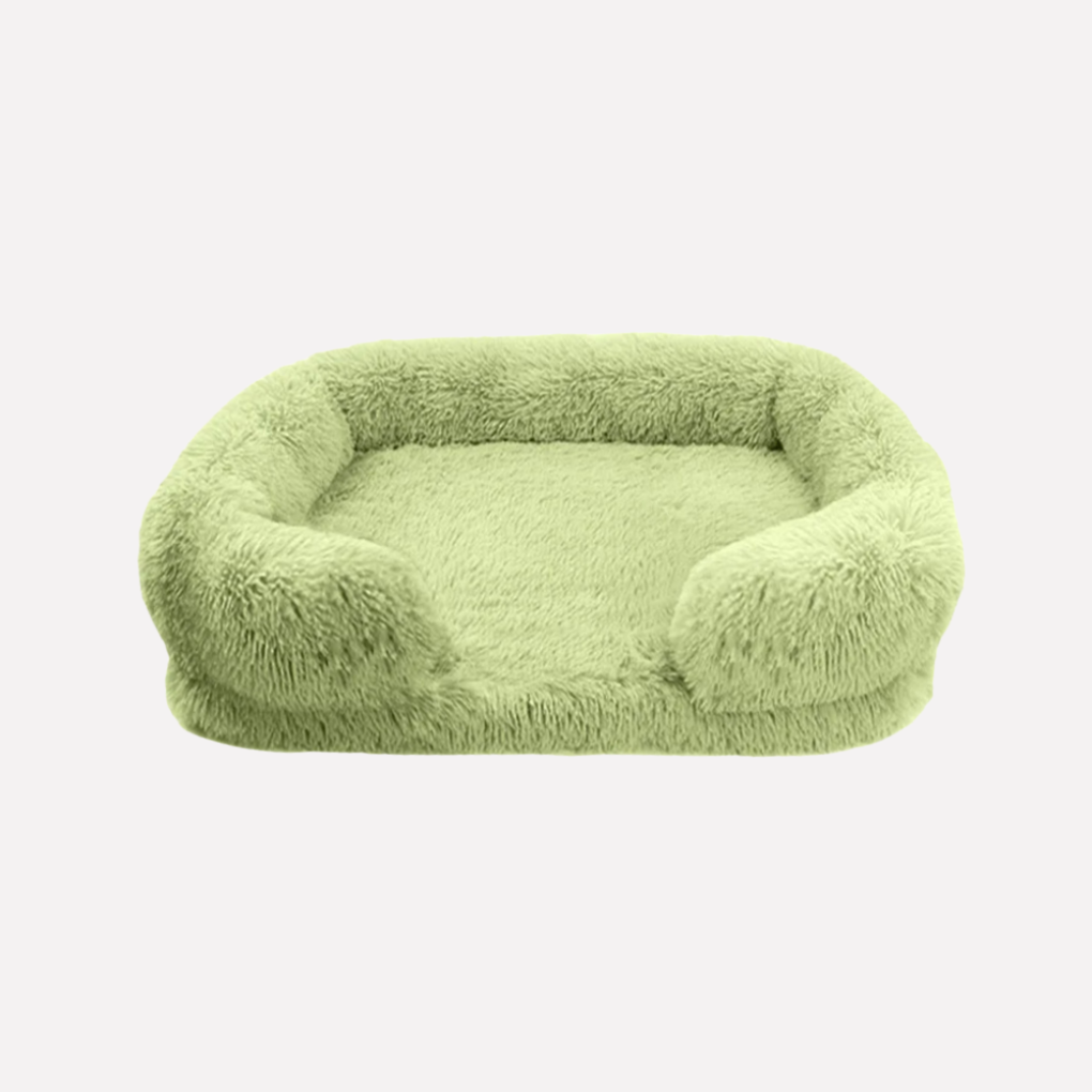 Fluffy plush pet bed, non-slip design, provides superior pet comfort.