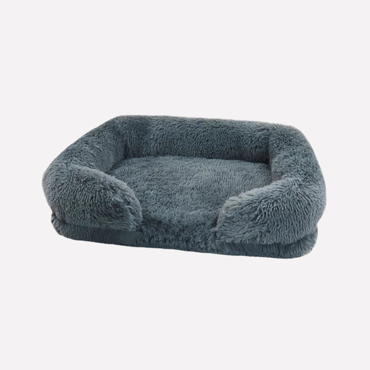 Comforting dog bed, plush material, non-slip base for peaceful pet sleep.