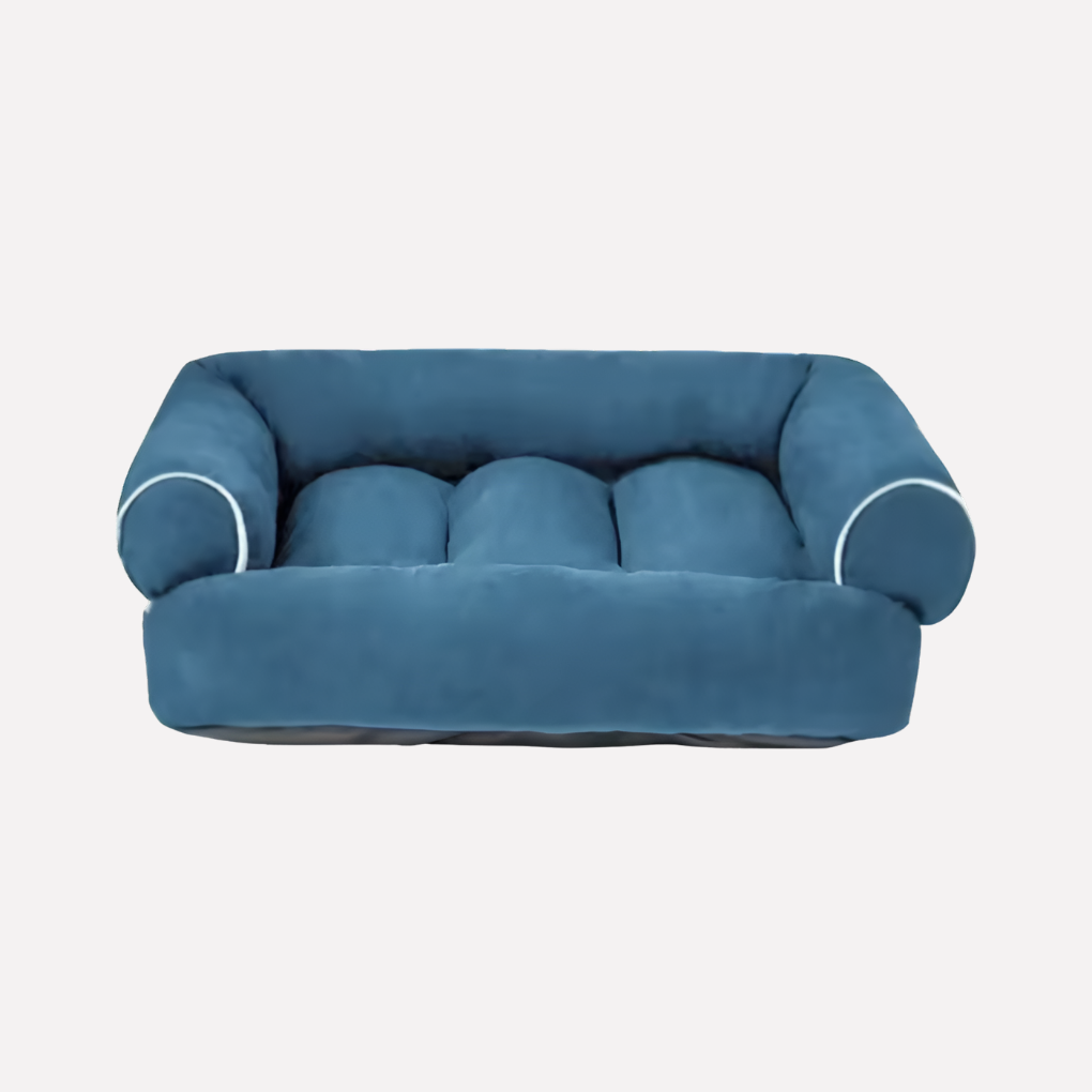 Plush U-shaped dog bed with high bolster for ultimate pet comfort, featuring a washable removable cover.