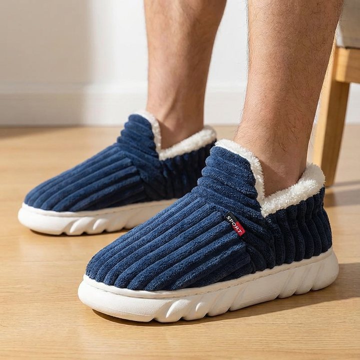 Unisex indoor slippers in a neutral color, plush and warm for ultimate home comfort