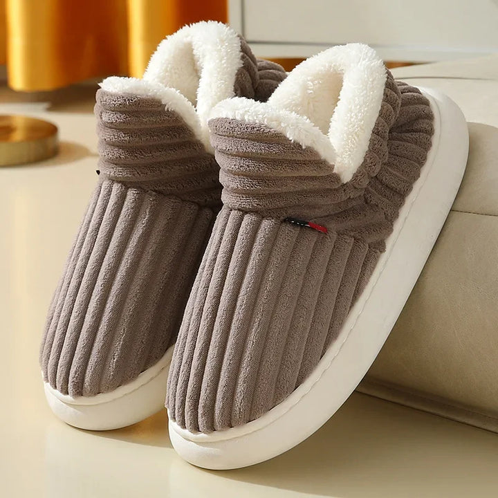 Unisex comfort slippers, designed for plush warmth and relaxation in an indoor setting
