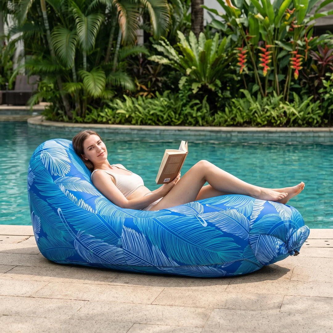 Portable inflatable lounge chair for outdoor comfort, perfect for beach, park, or camping. Easy setup & travel-friendly.