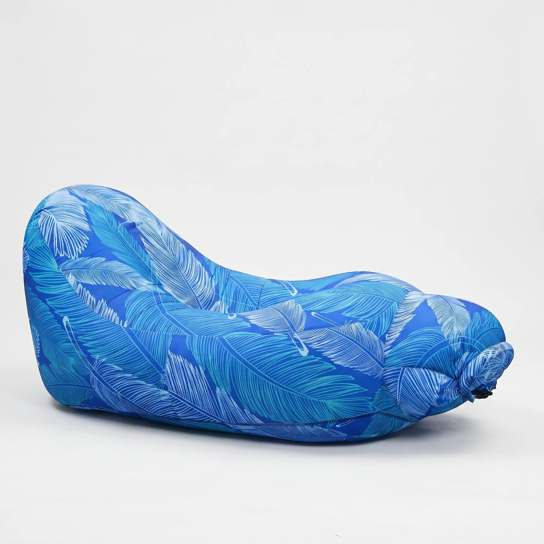 Inflatable sun lounger for relaxing in the garden or by the pool. Portable outdoor seating for ultimate comfort.