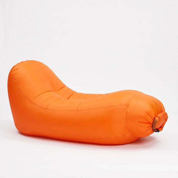 Lightweight inflatable lounge chair, great for camping gear, beach days, or an outdoor park lounge. Travel comfort.