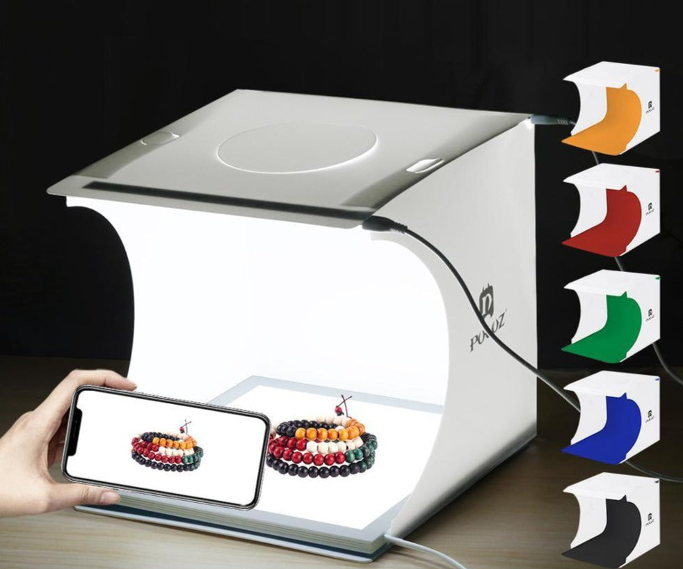 Compact photo box with LED lights, perfect for content creators to shoot professional product images.