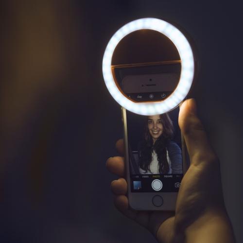 GlowSnap portable selfie ring light, delivers professional lighting for flawless photos & videos on the go.